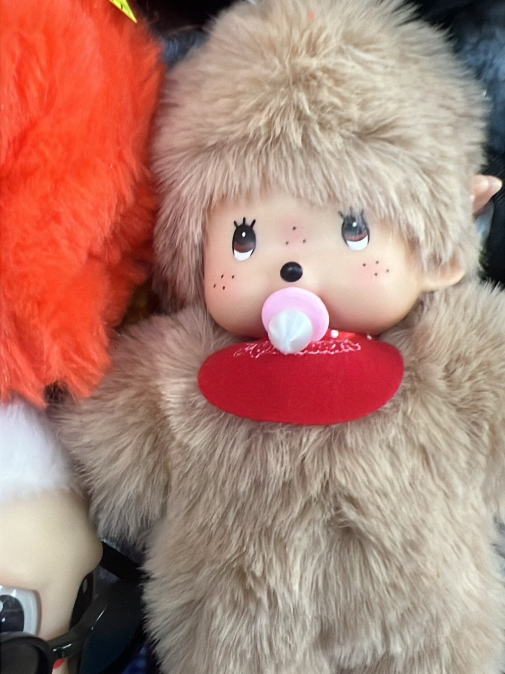 Plush Baby Doll with Pacifier - Beige Fur, Red Bib
